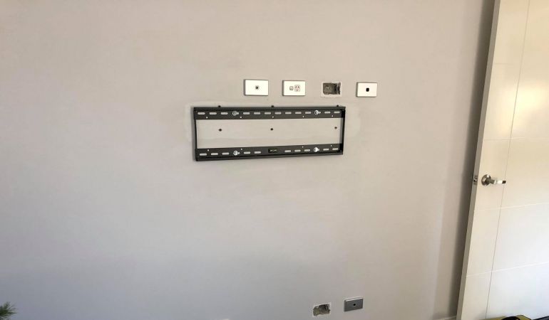 Remove TV and existing kit, fit new bracket.