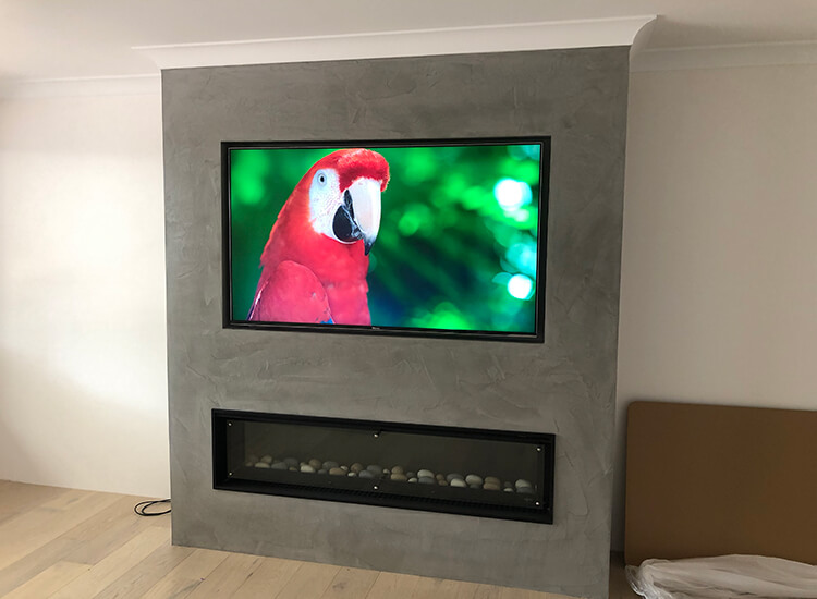 TV wall mounted on a feature wall
