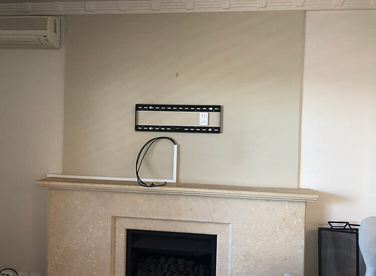 TV Bracket on Feature Wall above fire