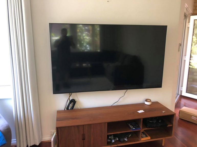 Sony 75” TV in a bayswater home looking very untidy