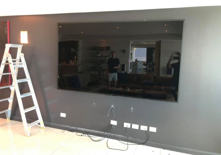 Halfway through hanging this 100* telly and preparing the wiring.