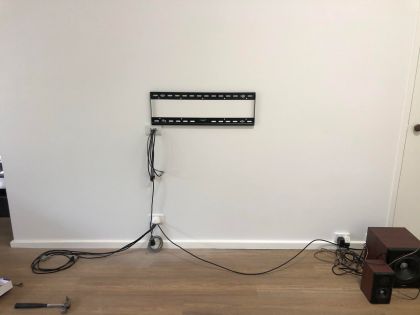 installing a TV using the cable punch through method