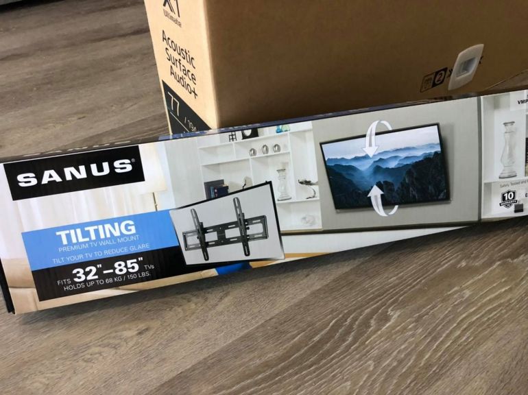 SANUS tilting wall mounting bracket in it's box