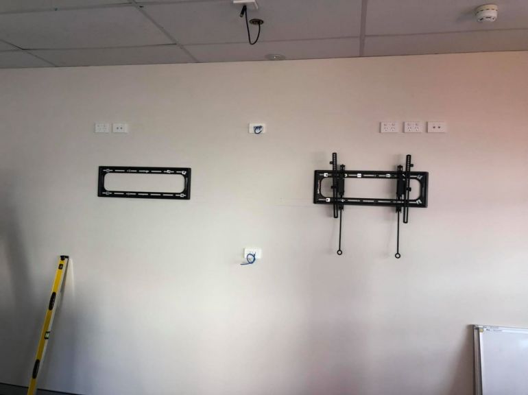 2 sanus brackets for mounting two tvs next to each other