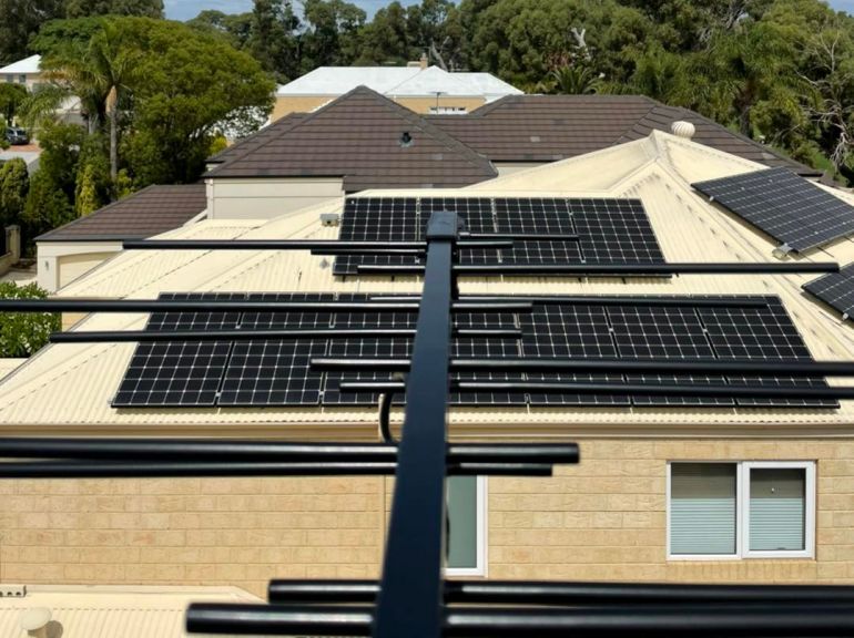 black arrow tv antenna and roof with solar panels