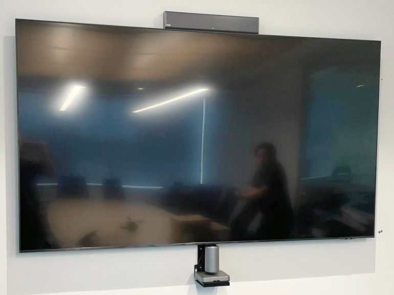 Large 85" TV and soundbar correctly wall mounted using a Sanus TV bracket