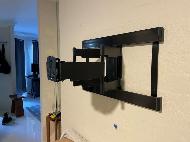 sanus bracket mounted on wall with no tv