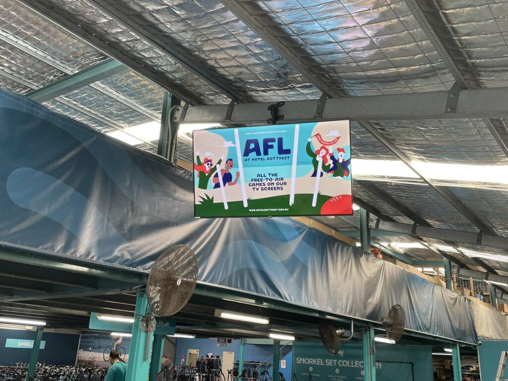 tv mounted on the ceiling at the rottnest peddle & flipper hire centre