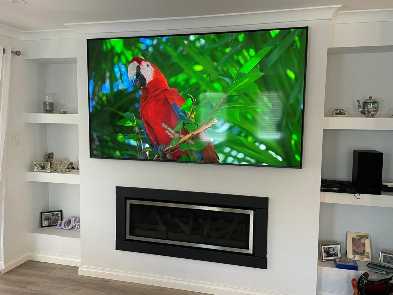 86" lg tv mounted using sanus bracket in quinns rocks house