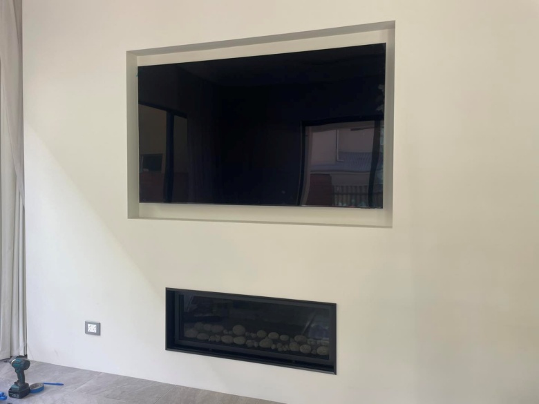 Samsung 75” One Connect 8K TV mounted into a wall recess