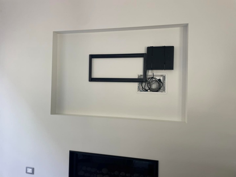 tv bracket and one connect box fitted into wall recess