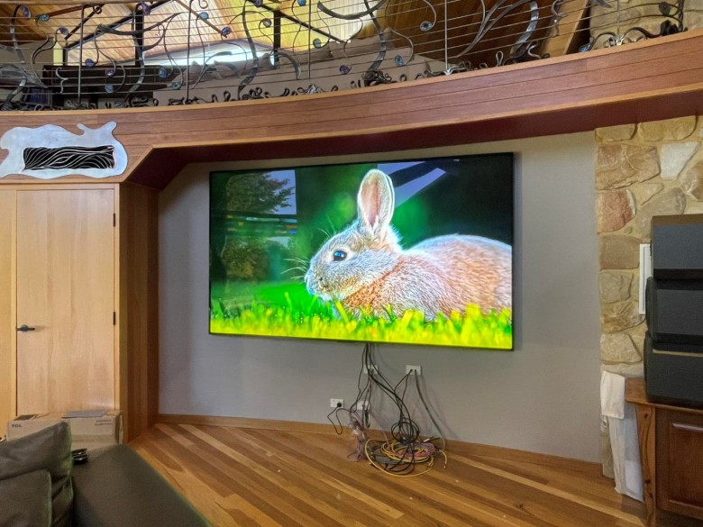 wall mounted 115" tv in roleystone home