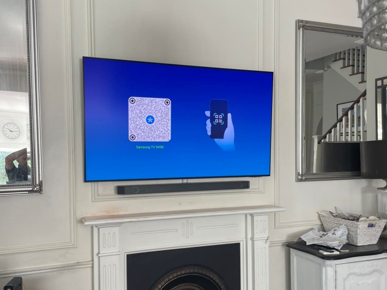 tv mounted above fireplace in west leederville home
