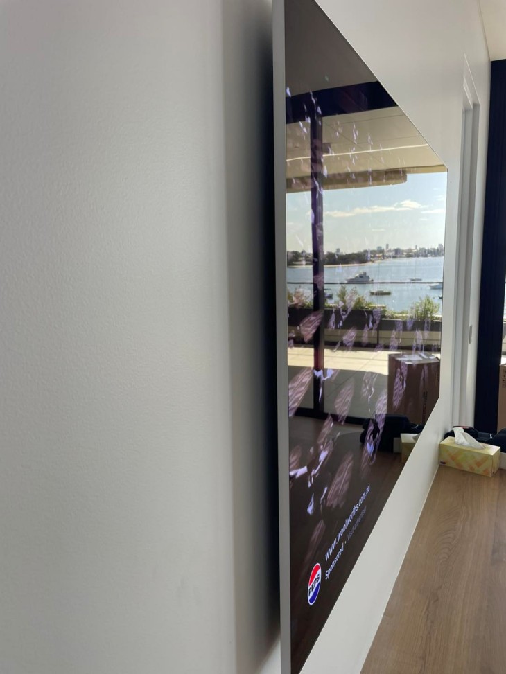 very low profile mounted tv sitting close to the wall