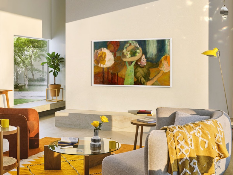 samsung the frame pro tv hanging in living room