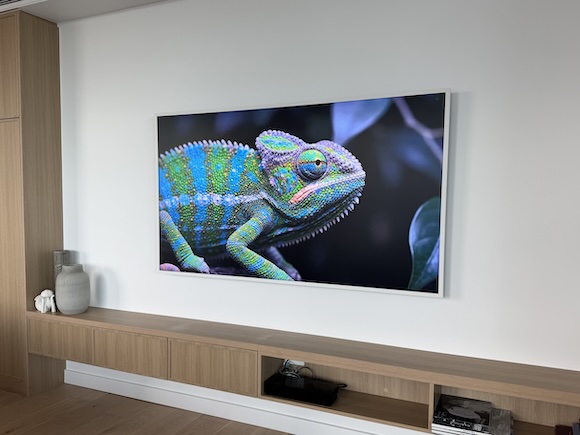 Large TV mounted on gyprock wall in apartment